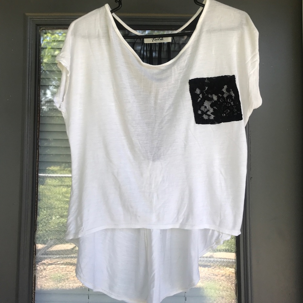 White and black high-low blouse.